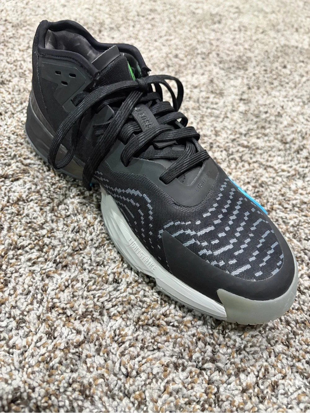 adidas Men's D.O.N Issue #4 Black Sneaker with Bright Blue Three Stripes